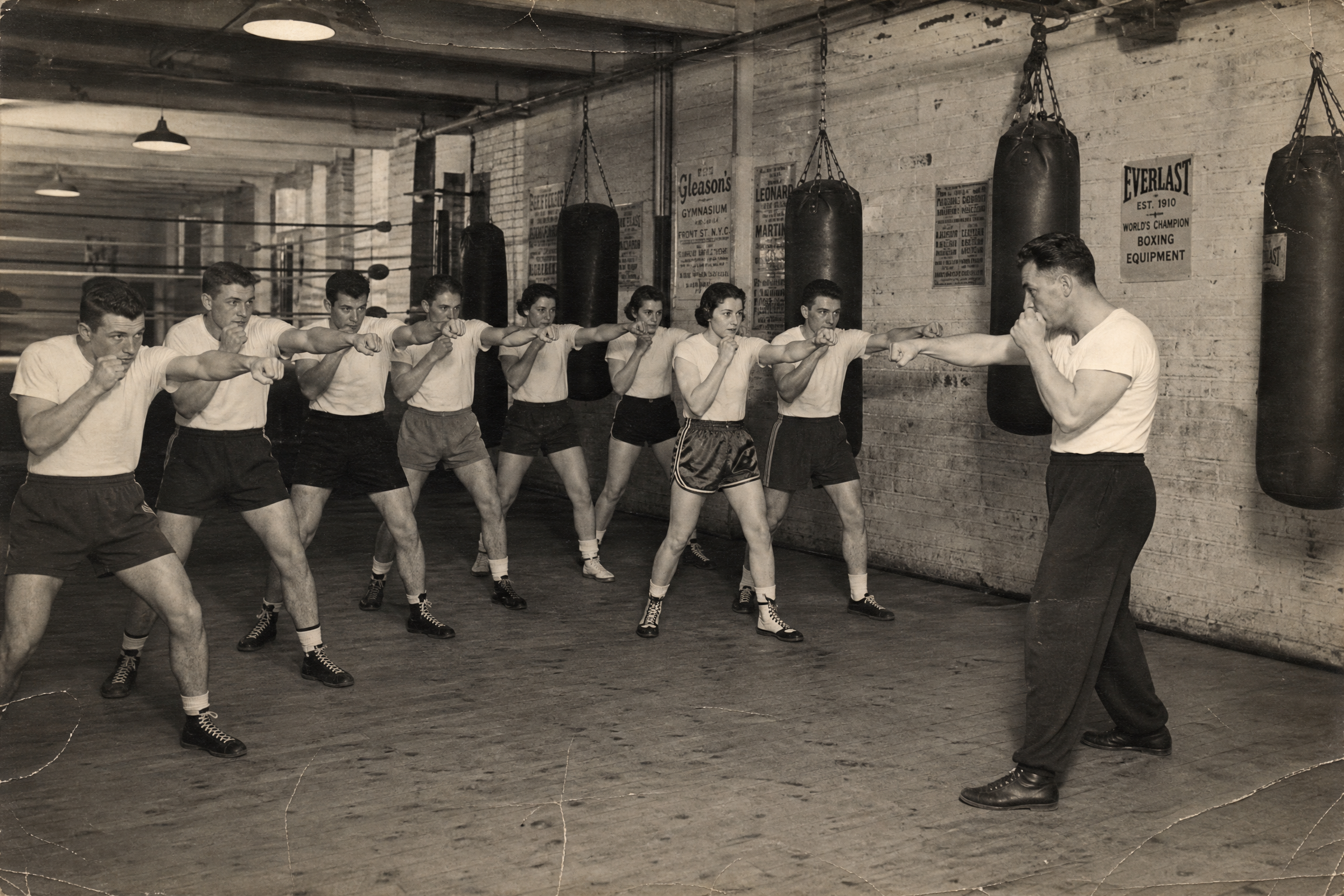 Group boxing class — the crew throwing jabs in unison